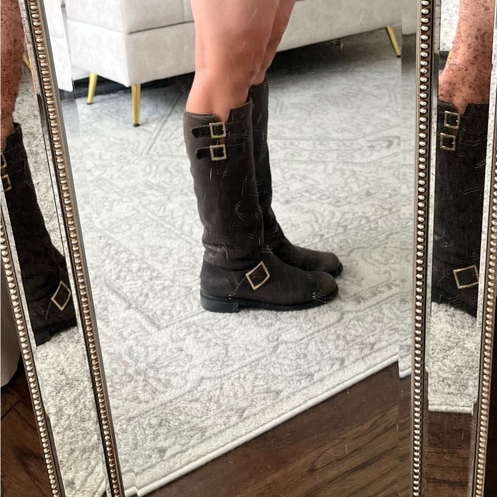 Jimmy Choo boots. Used but still in good condition.